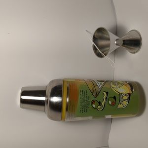 Vtg glass cocktail shaker. 1960's. With recipes printed on outside.